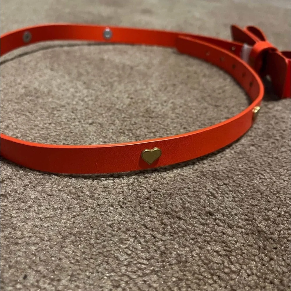 EUC Lot of 2 girls Orange Bow Belt and pink belt
